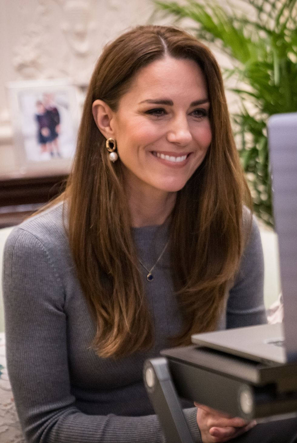 Kate Middleton In Gray Sweater Wallpaper