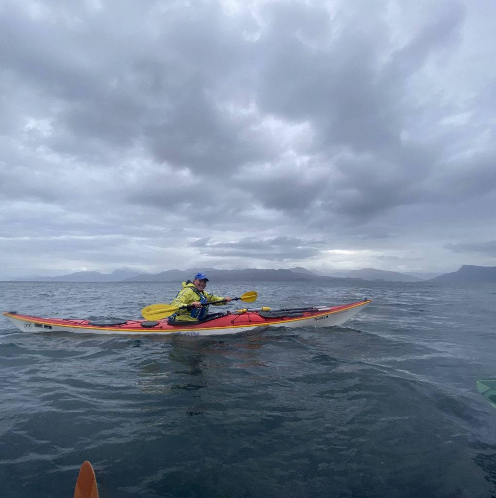 Kayaking During A Storm Wallpaper