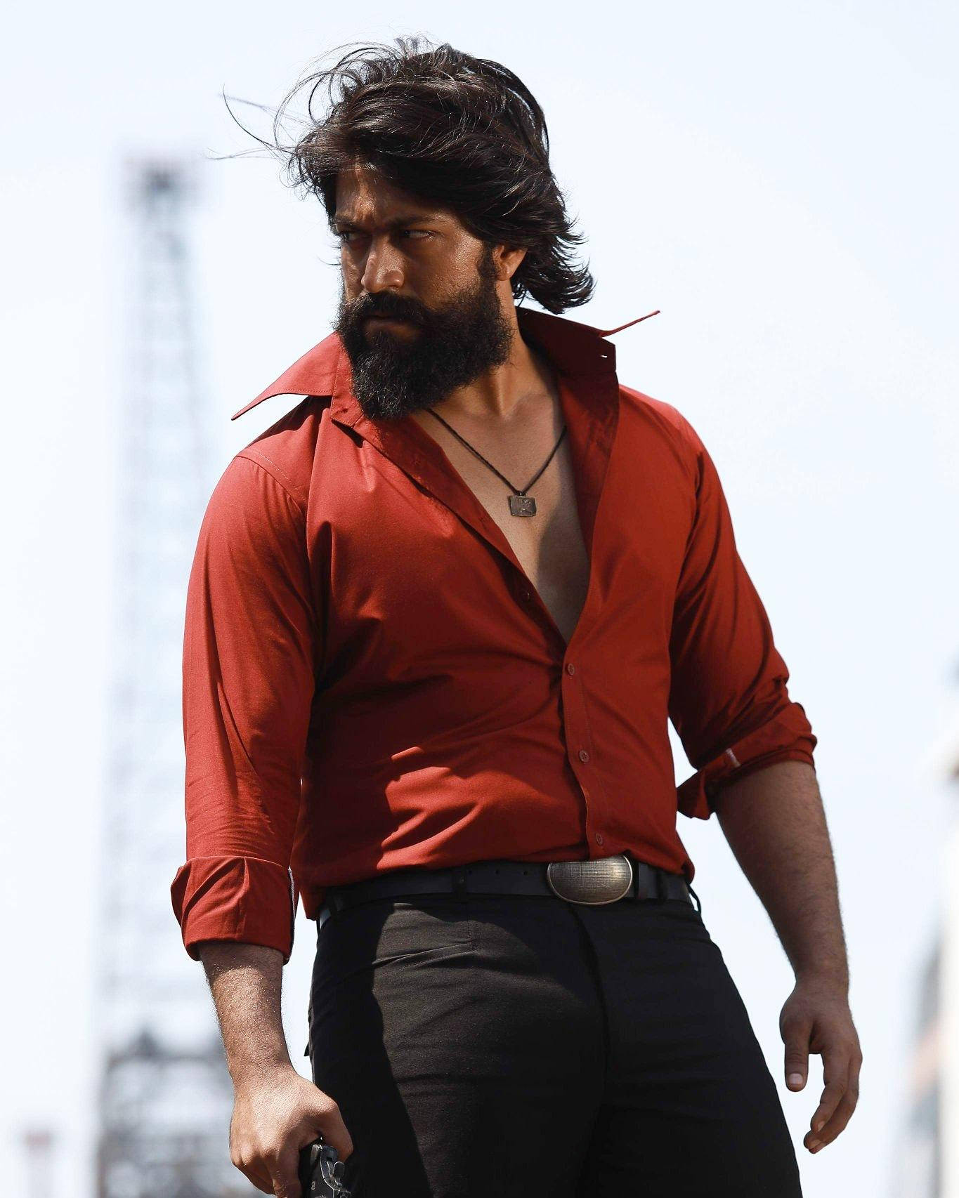 Kgf Rocky In Red Shirt Wallpaper
