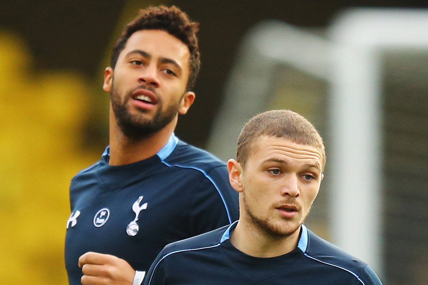 Kieran Trippier And Mousa Dembele On The Field Wallpaper