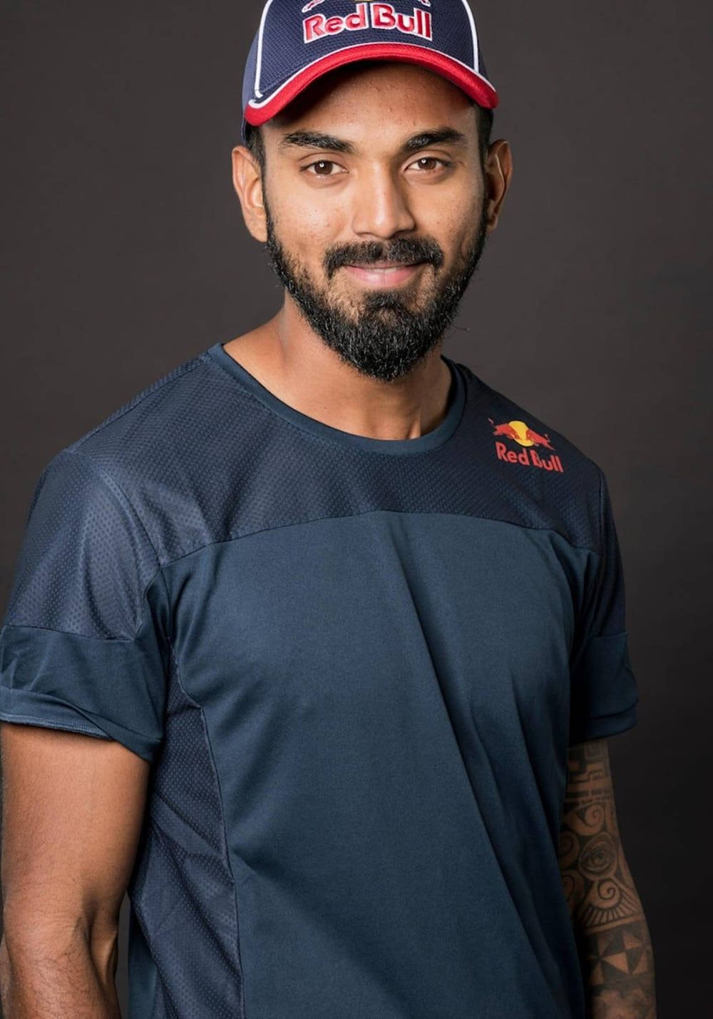 Kl Rahul Smiling For Red Bull Wallpaper