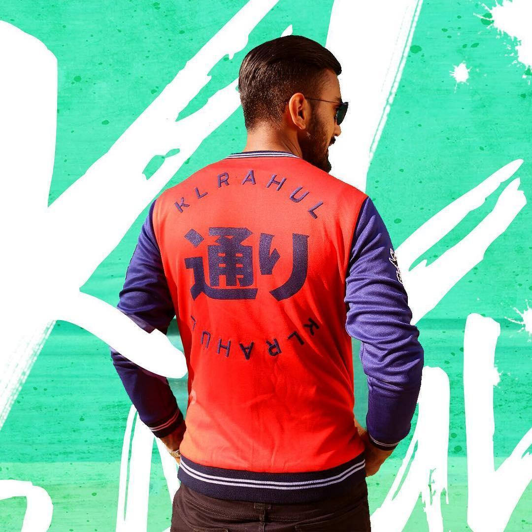 Kl Rahul Wearing A Red Fitted Varsity Jacket Wallpaper