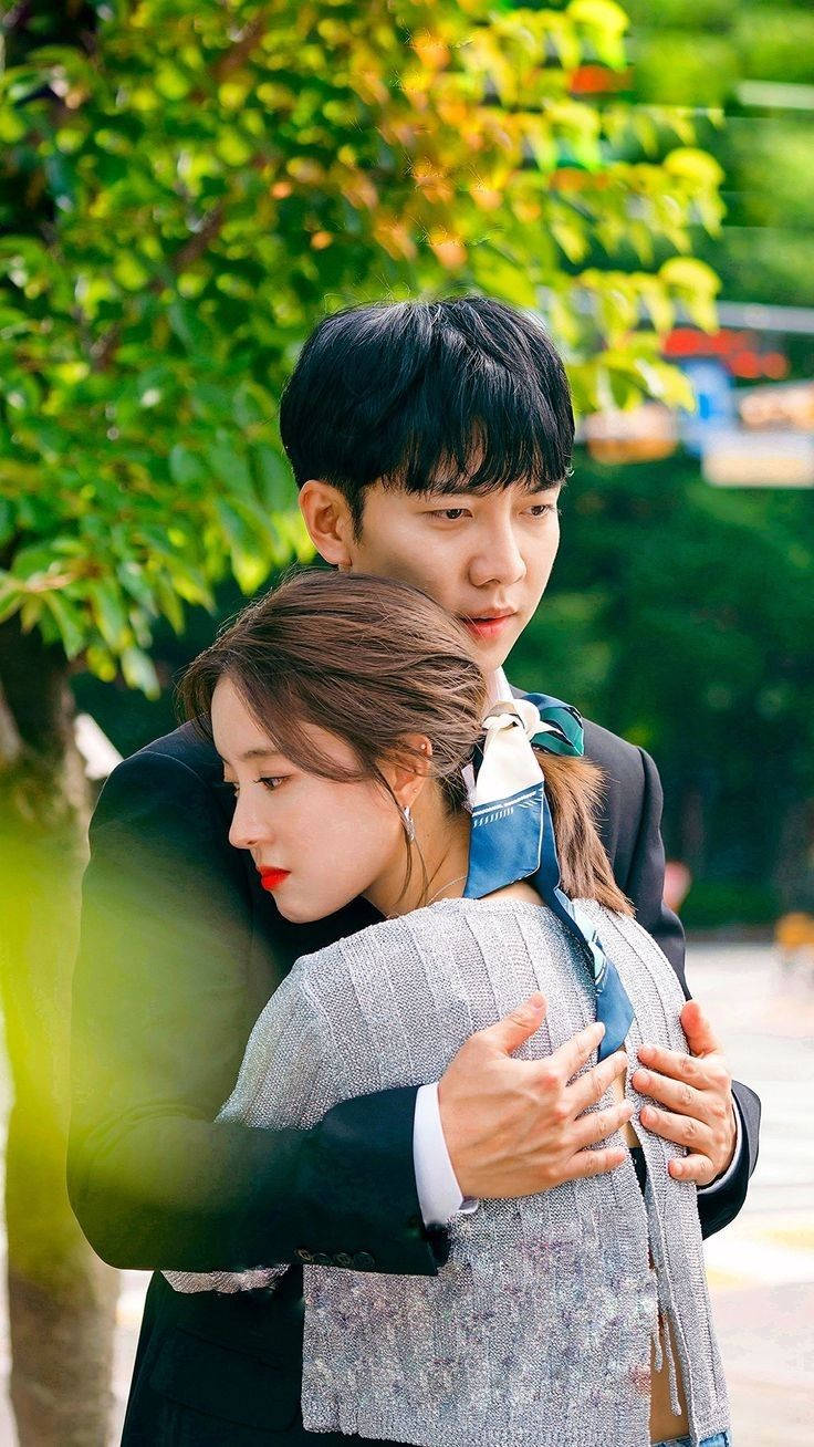 Korean Couple Dramatically Hugging Wallpaper