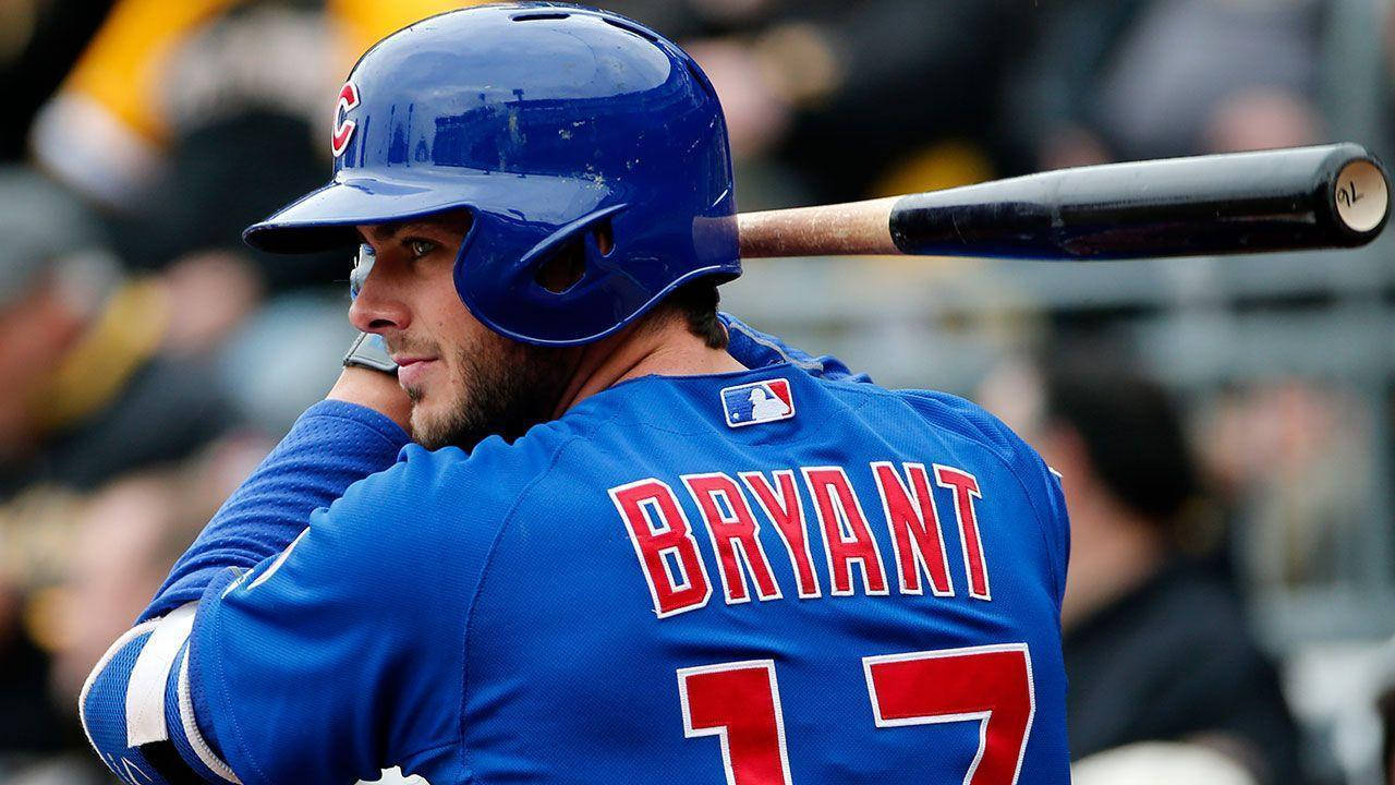 Kris Bryant Batting In Blue Uniform Wallpaper