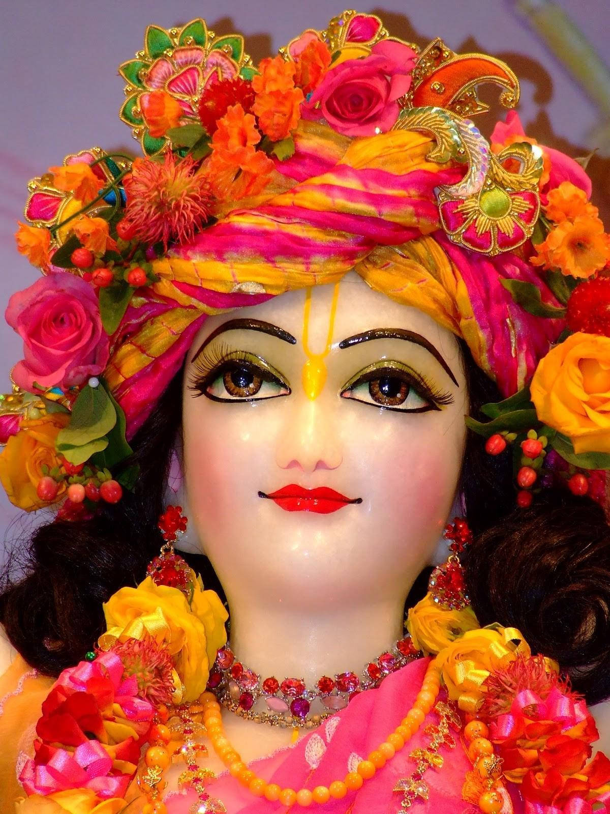 Krishna Ji In Orange And Pink Wallpaper