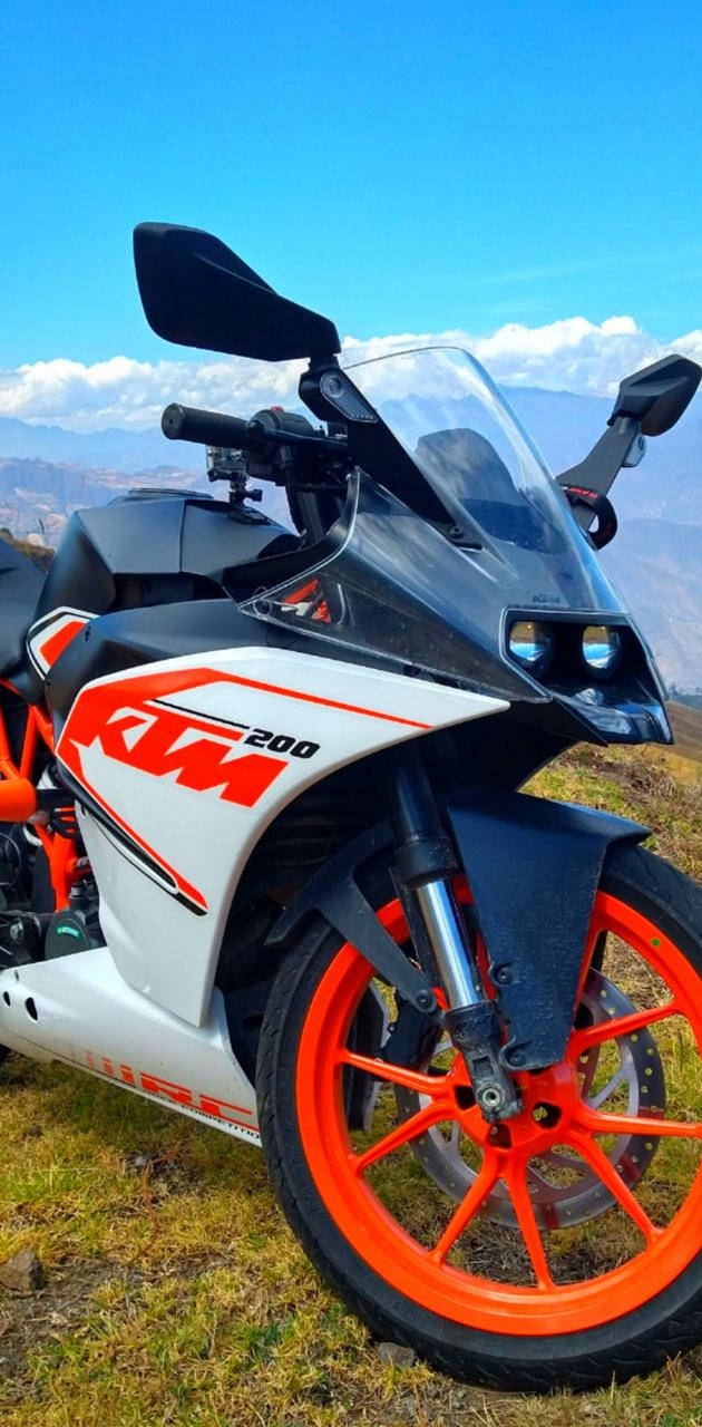 Ktm Rc 200 In Mountains Wallpaper