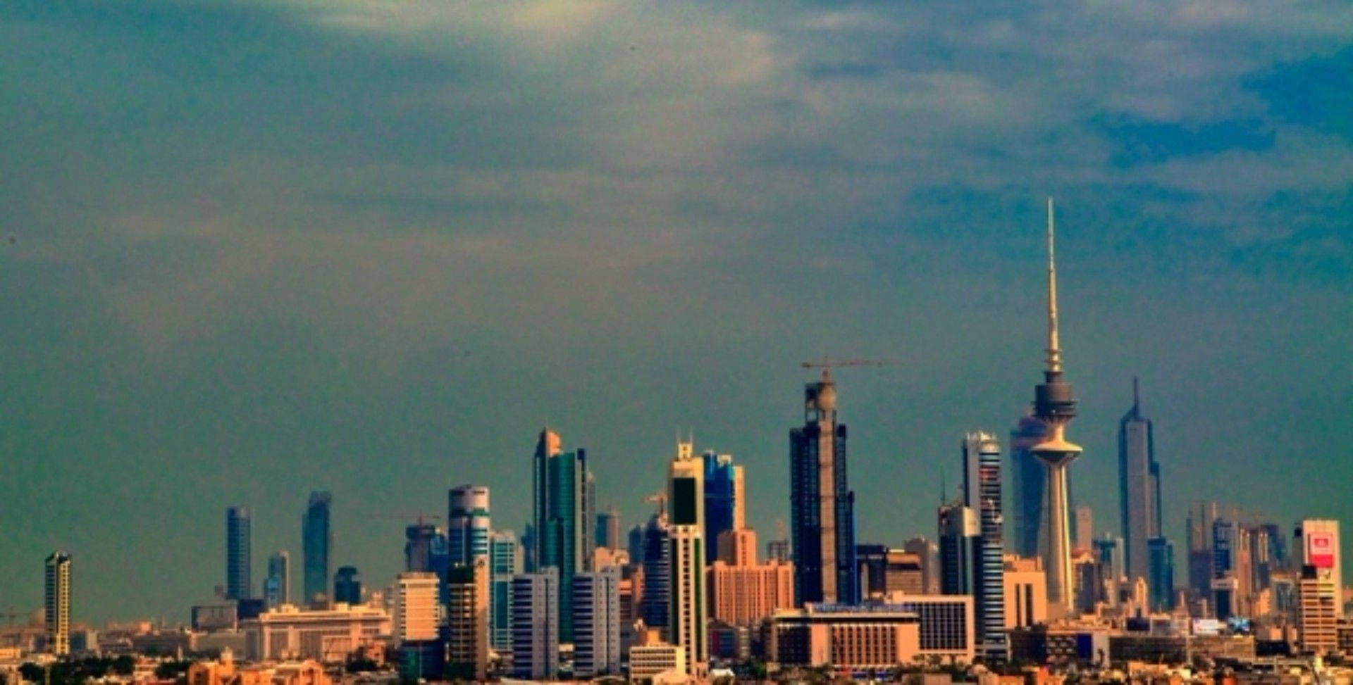 Sunset over Kuwait City skyline