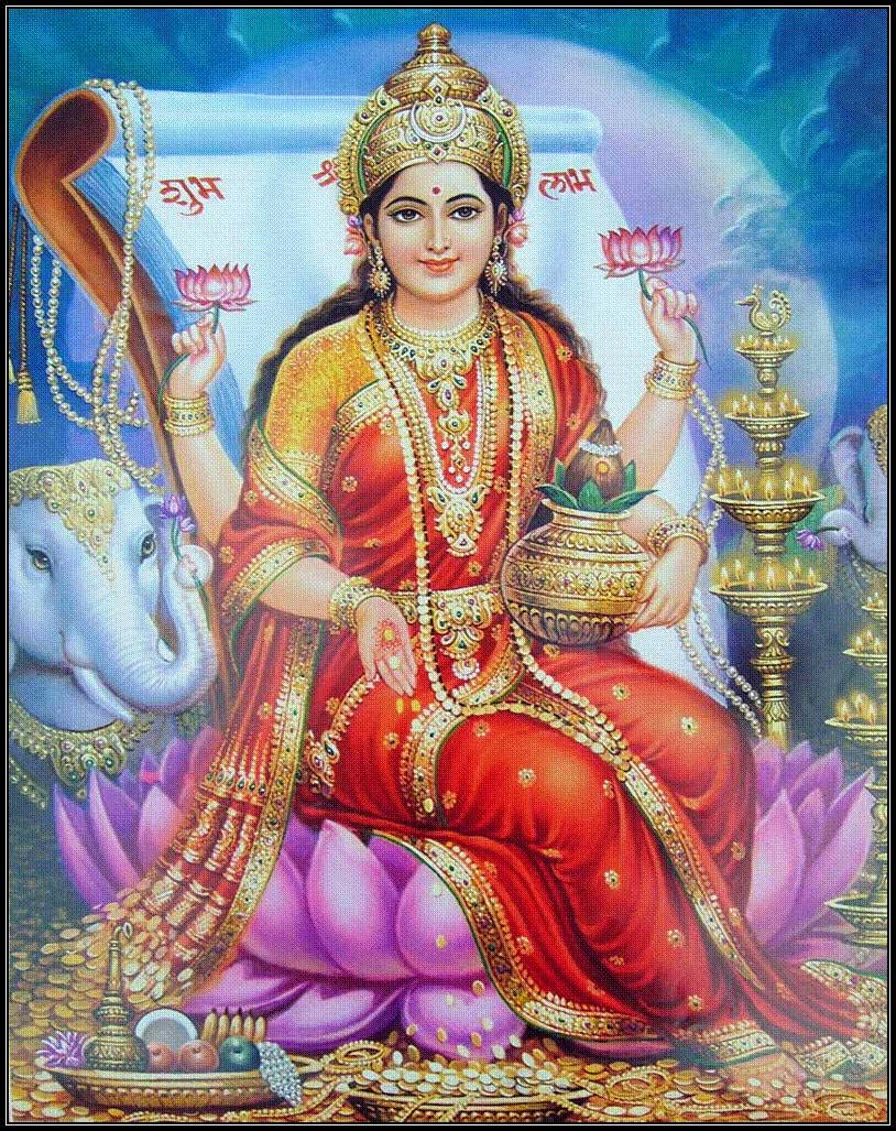 Lakshmi Devi With A Book Wallpaper