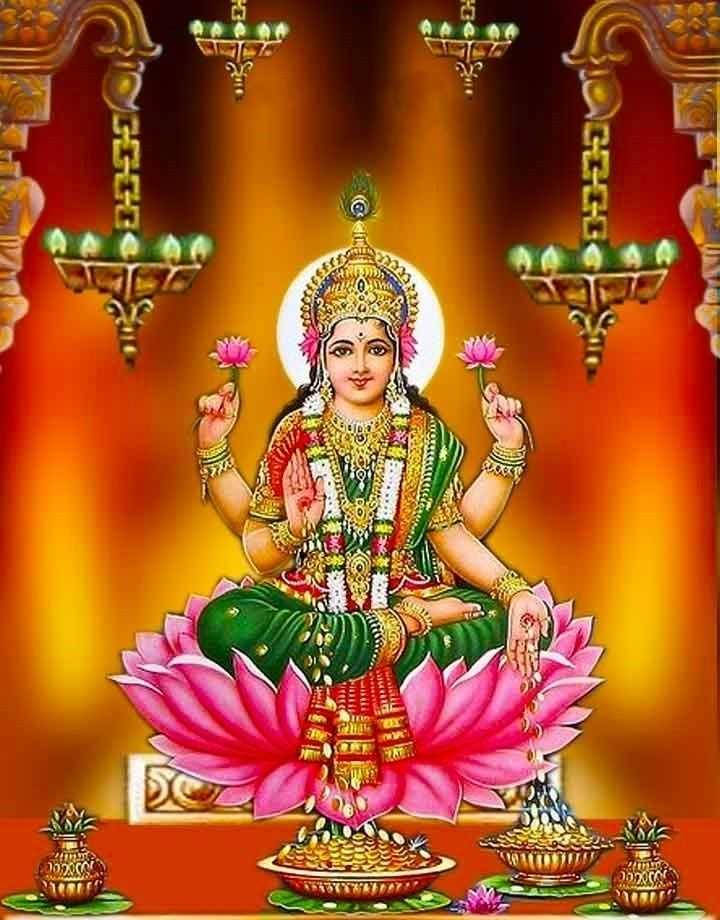 Lakshmi Devi With Lamps Wallpaper