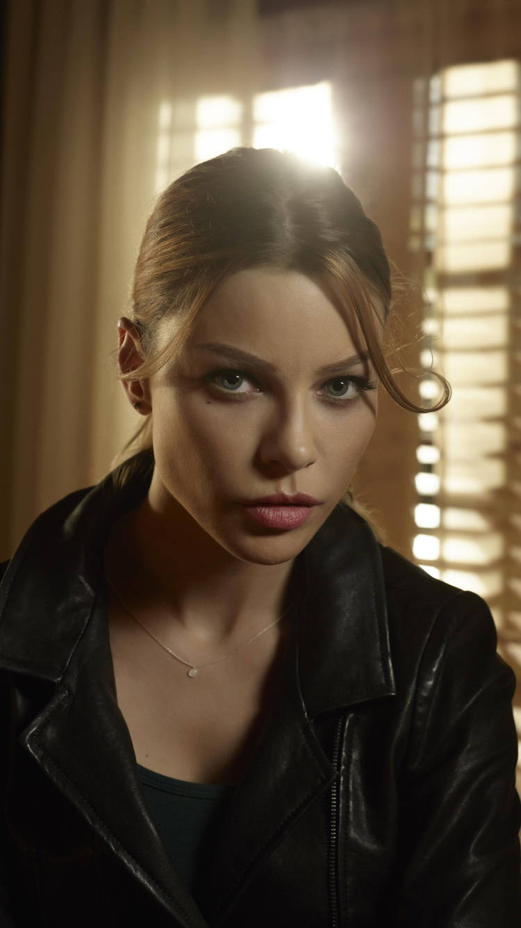 Lauren German Facing Against The Window Wallpaper