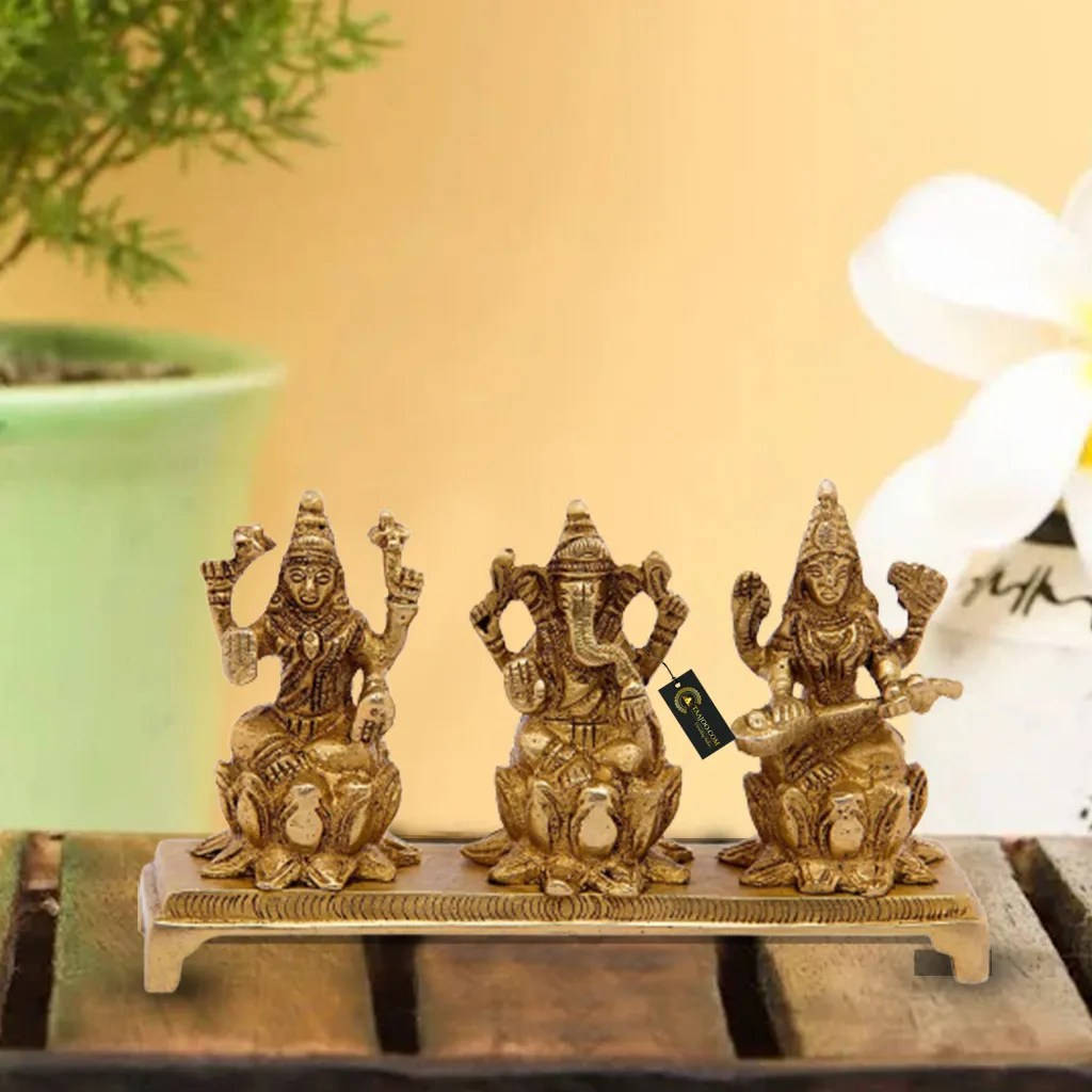 Laxmi Ganesh Saraswati Golden Figurine Wallpaper