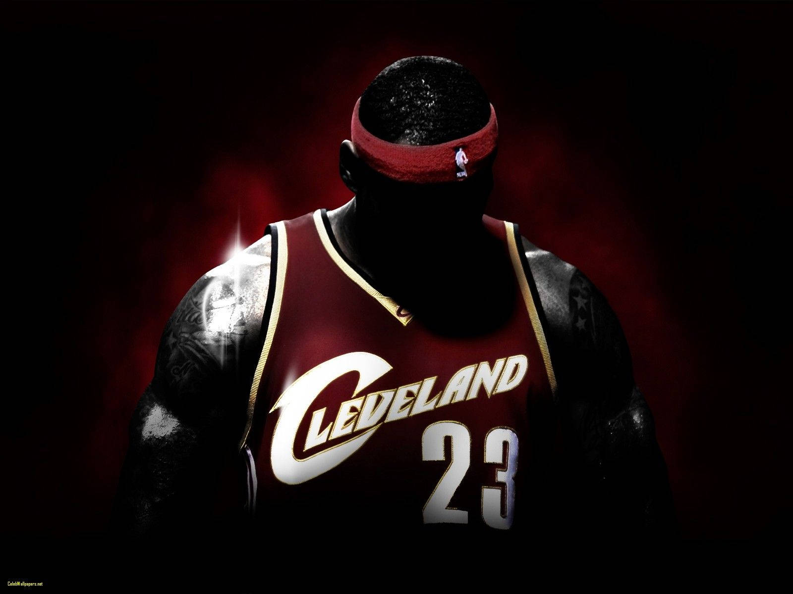 Lebron James Rocking A Red Cleveland Cavaliers Jersey Wallpaper