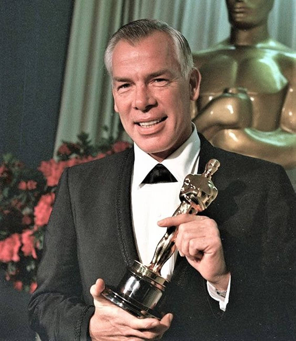 Lee Marvin Holding Trophy Wallpaper