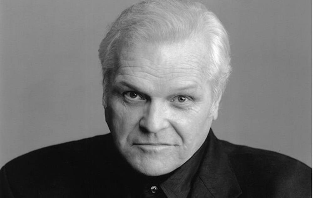 Legendary Actor Brian Dennehy In Front Of A Gray Background Wallpaper