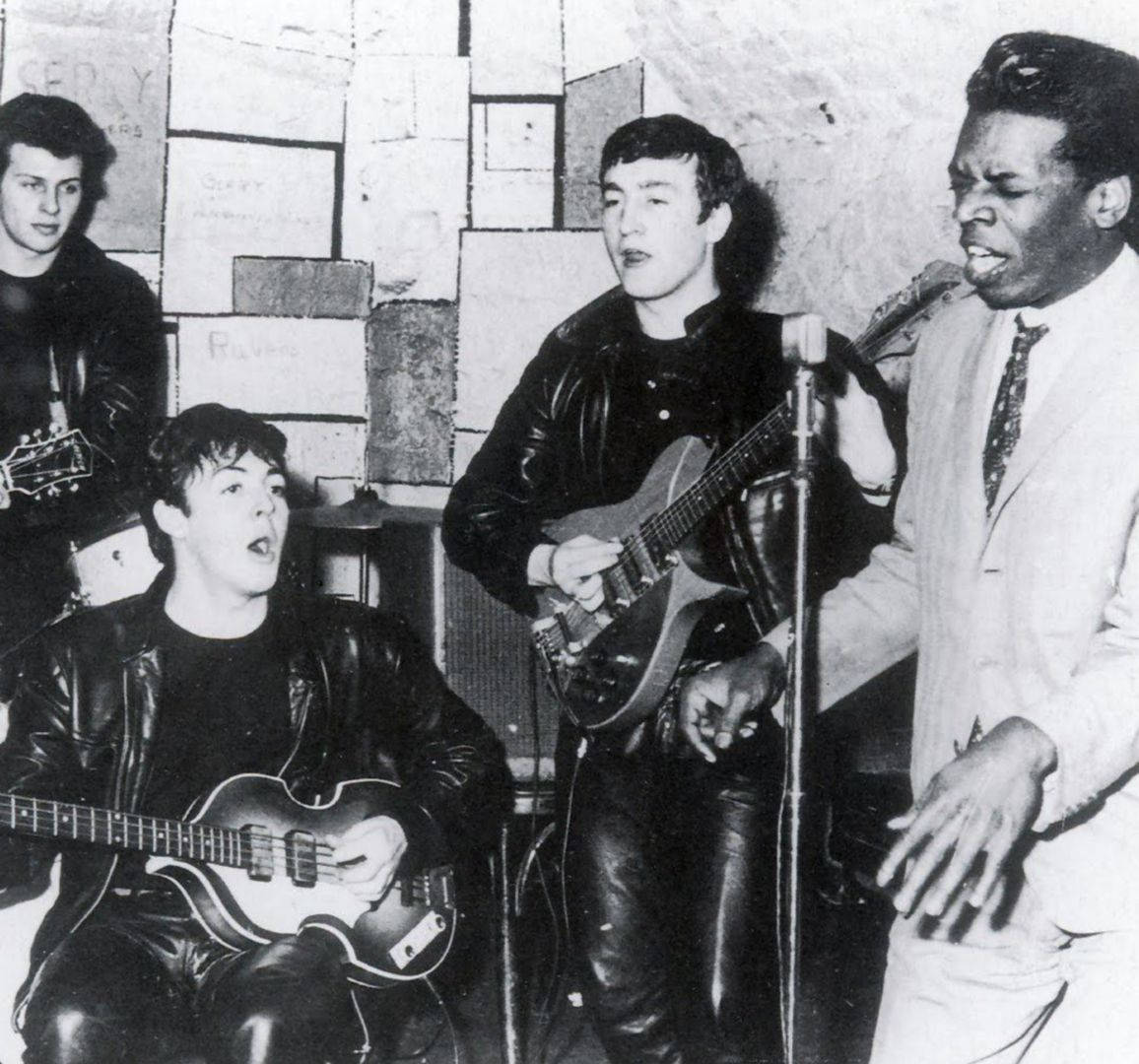 Legendary American Soul Singer Wilson Pickett With The Iconic British Band, The Beatles. Wallpaper