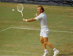 Legendary Tennis Player, Rod Laver, In Field Action Wallpaper