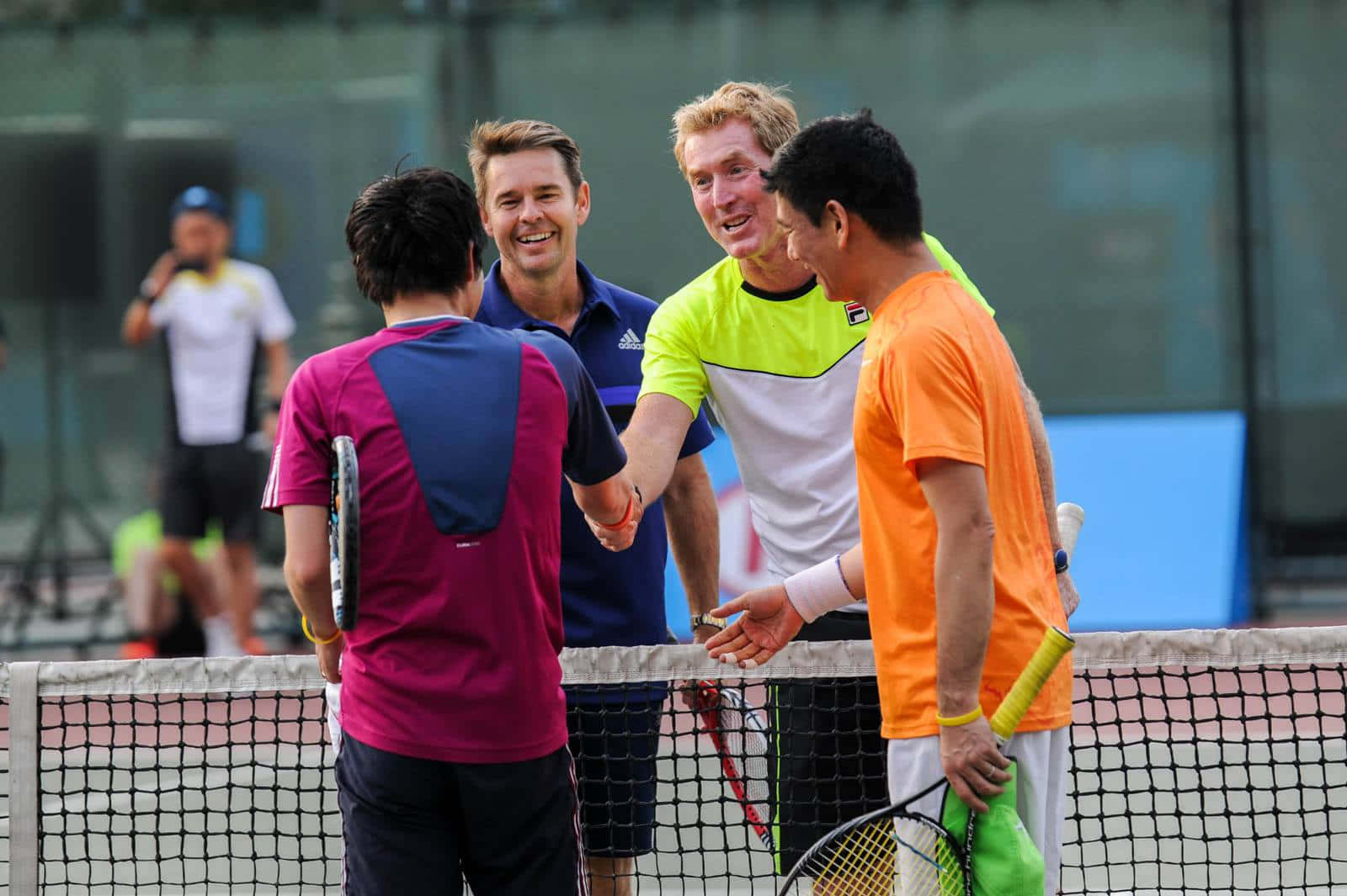 Legendary Tennis Player Todd Woodbridge Showing Sportsmanship On The Court Wallpaper