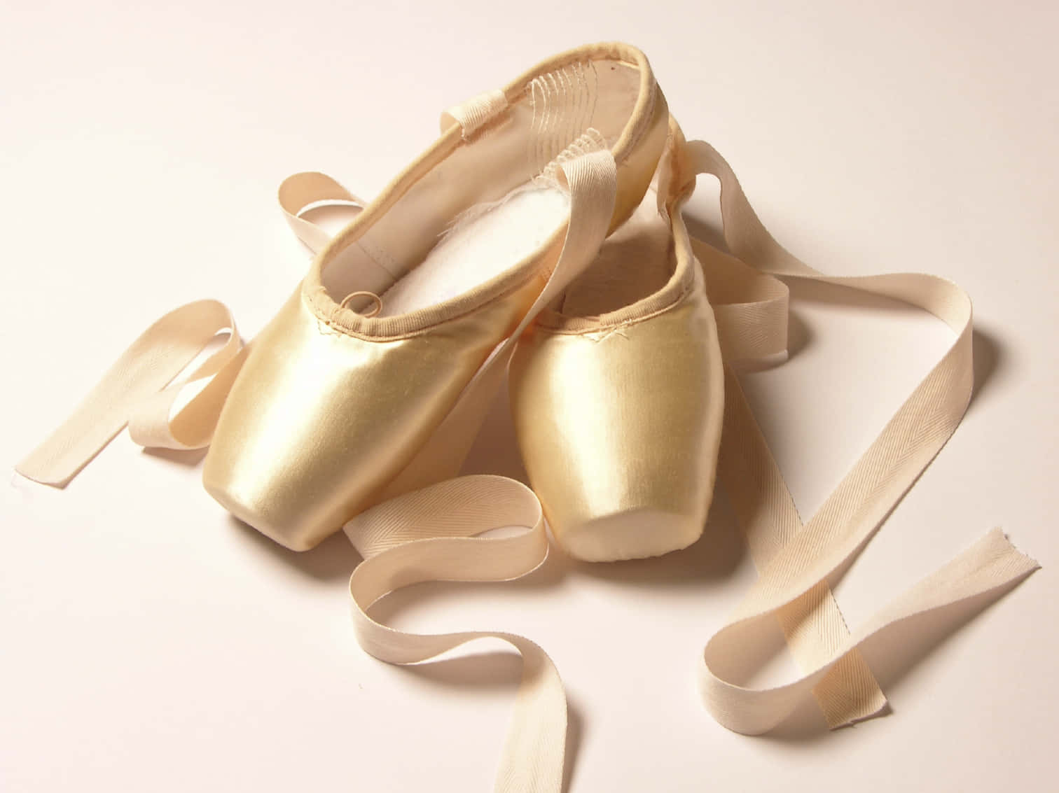 Light Gold Pointe Shoes Wallpaper