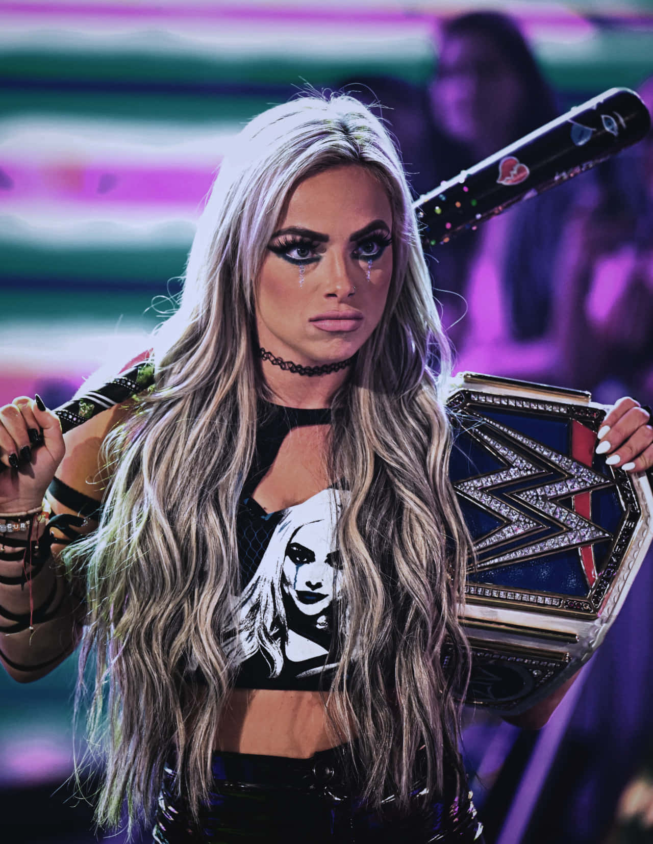 Liv Morgan Holding Wwe Belt Black Bat Wallpaper