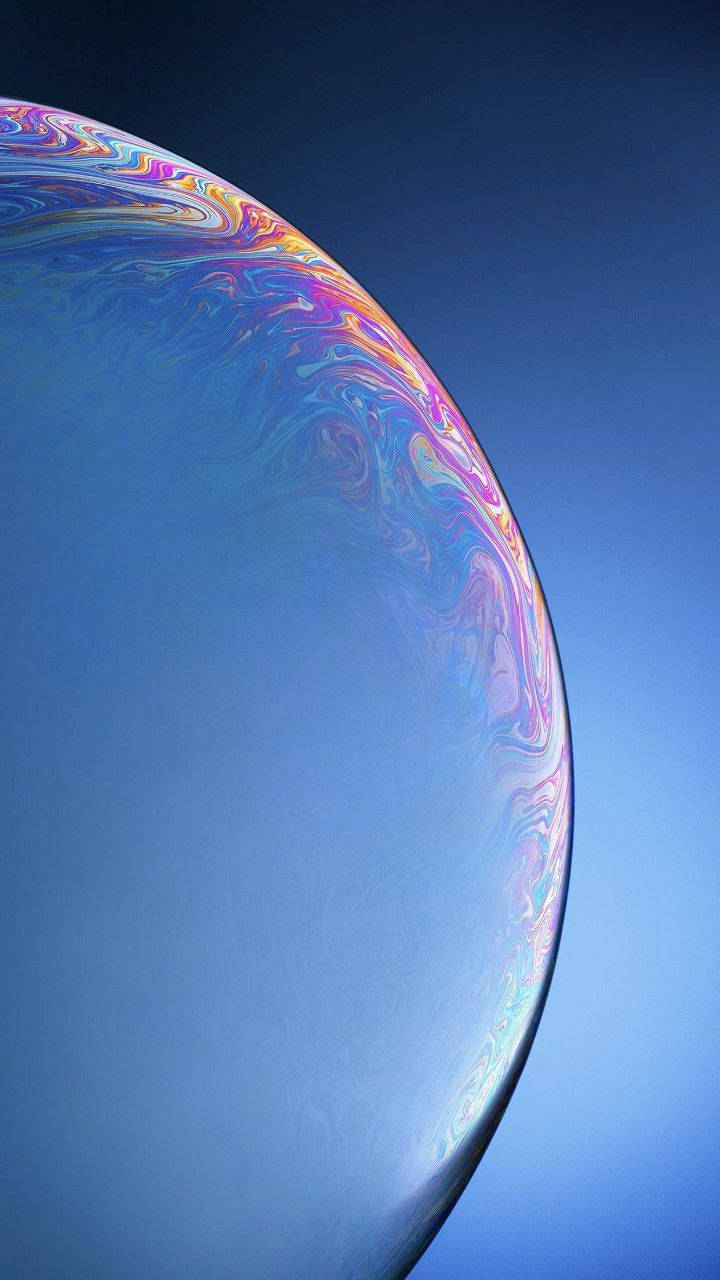 Lively Multi-colored Bubble Image Displayed On An Original Iphone 7 Wallpaper