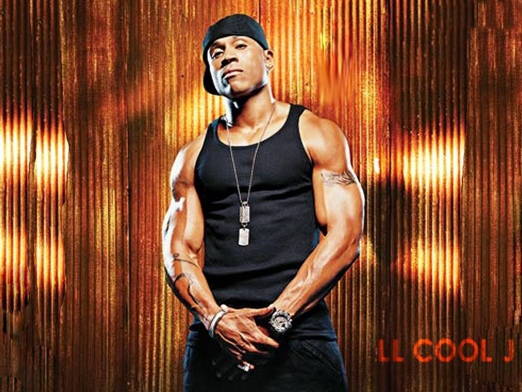 Ll Cool J Striking A Pose During His 1990 Album Photoshoot Wallpaper