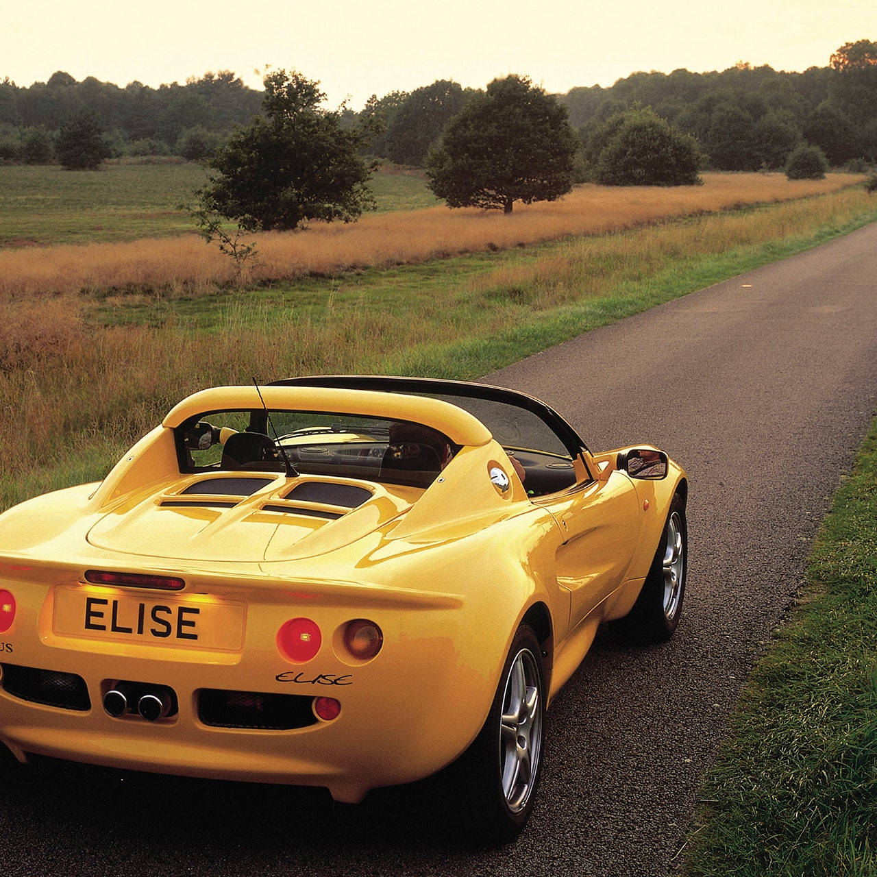 Lotus Elise Car On Lonely Road Wallpaper