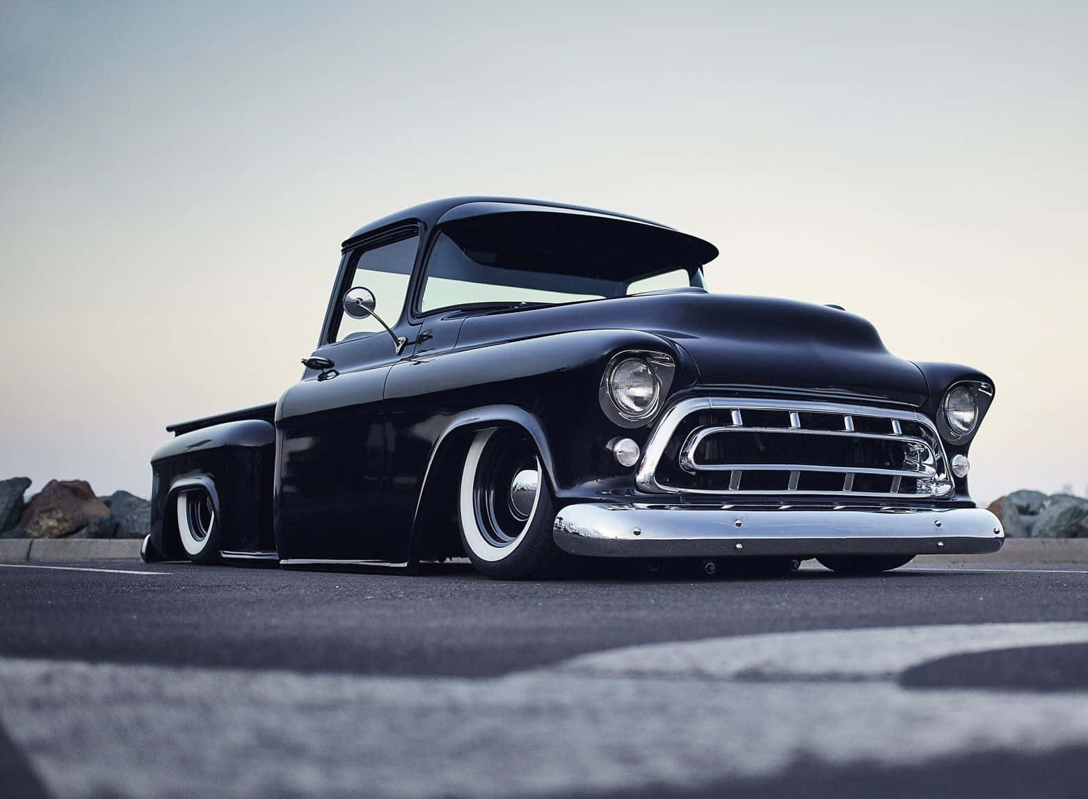 Low Truck Sitting On Highway Wallpaper