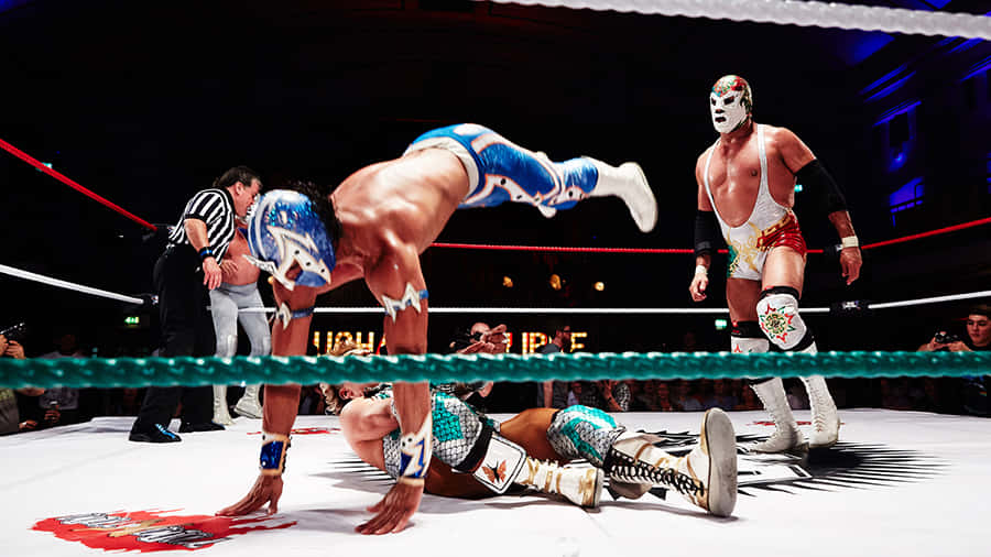 Lucha Libre Action In Ring Wallpaper