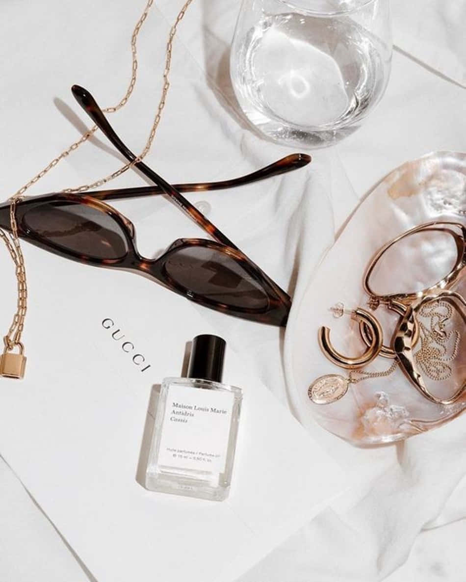 Luxury Aesthetic Gucci Items Wallpaper