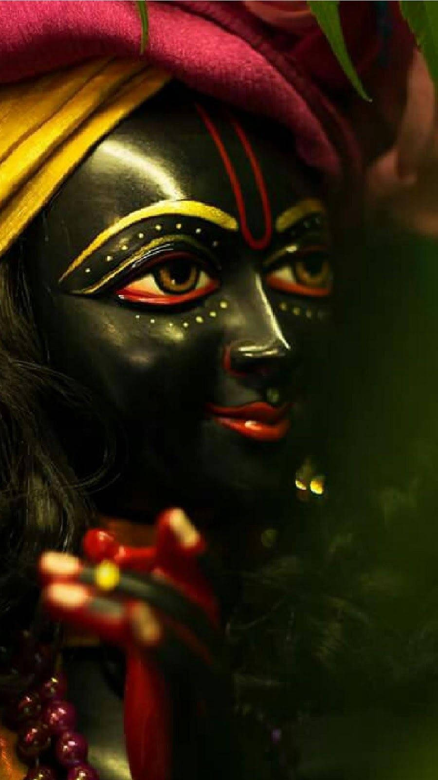 Majestic Black Krishna Statue Taken With Phone Camera Wallpaper