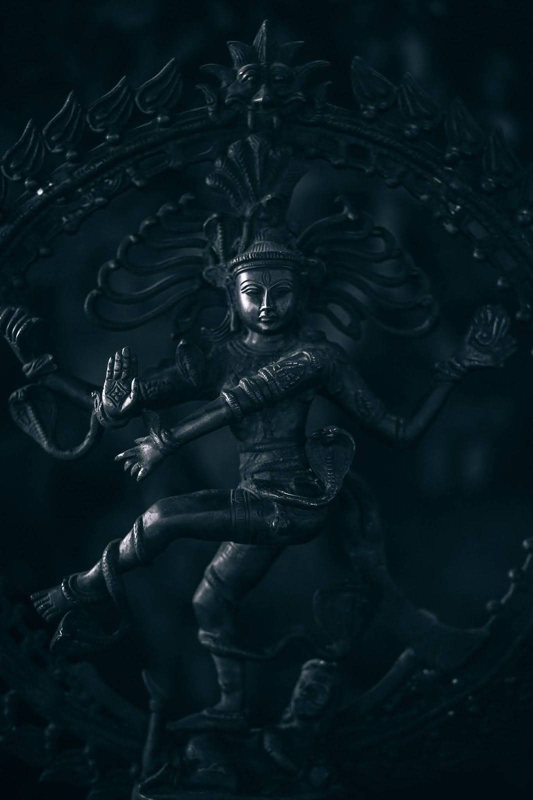 Majestic Four-armed Black Shiva Statue Wallpaper
