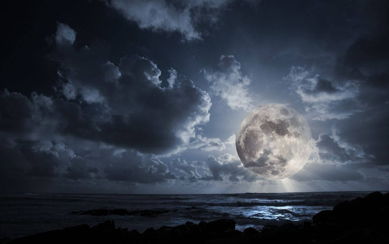Majestic Full Moon On A Dark Night Wallpaper