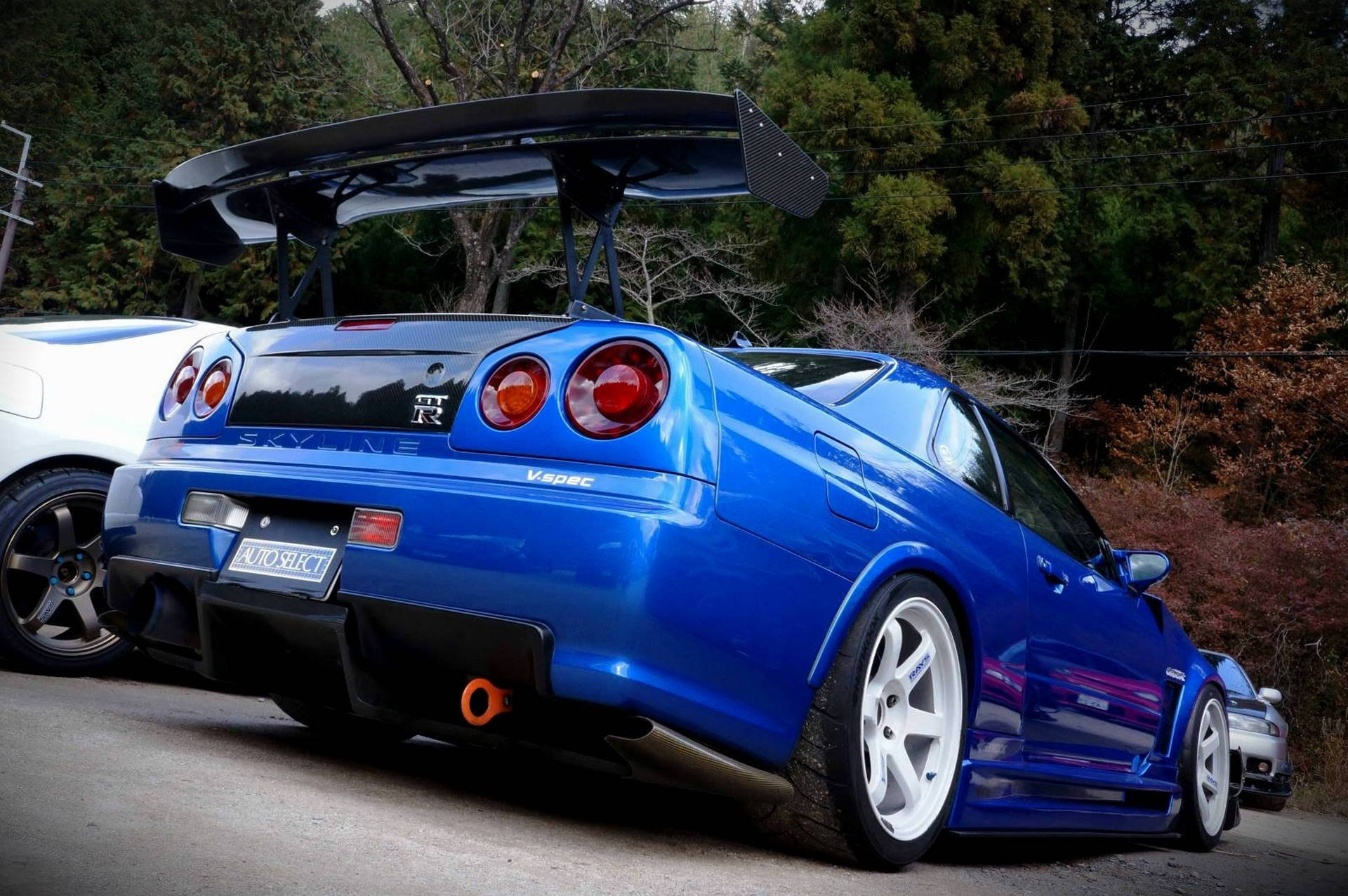 Download free Majestic Shot Of A Nissan Skyline Gtr R34 In High-definition.  Wallpaper - MrWallpaper.com