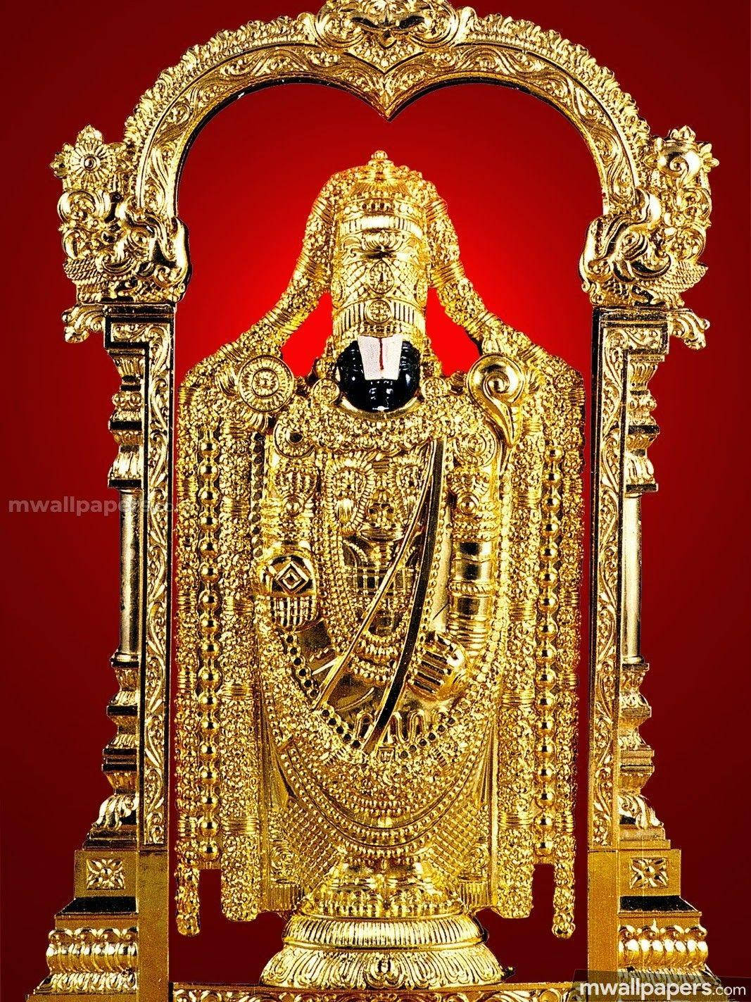 Majestic Statue Of Lord Venkateswara In Tirupati Balaji Wallpaper