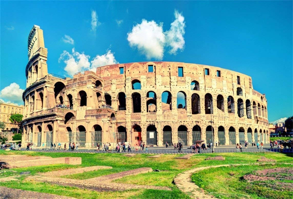 Majestic View Of The Colosseum At Sunset Wallpaper