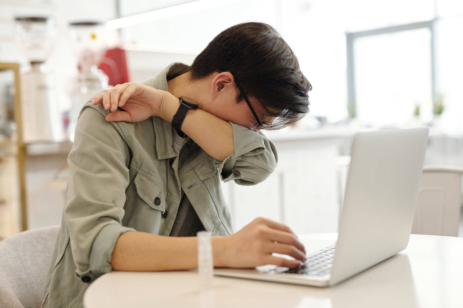 Man Covering Sneeze Wallpaper