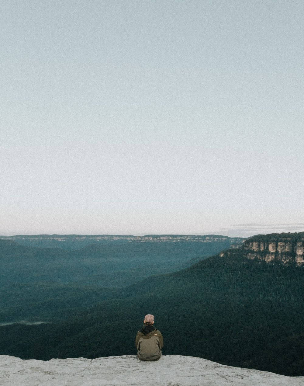 Man On A Cliff Indie Phone Wallpaper