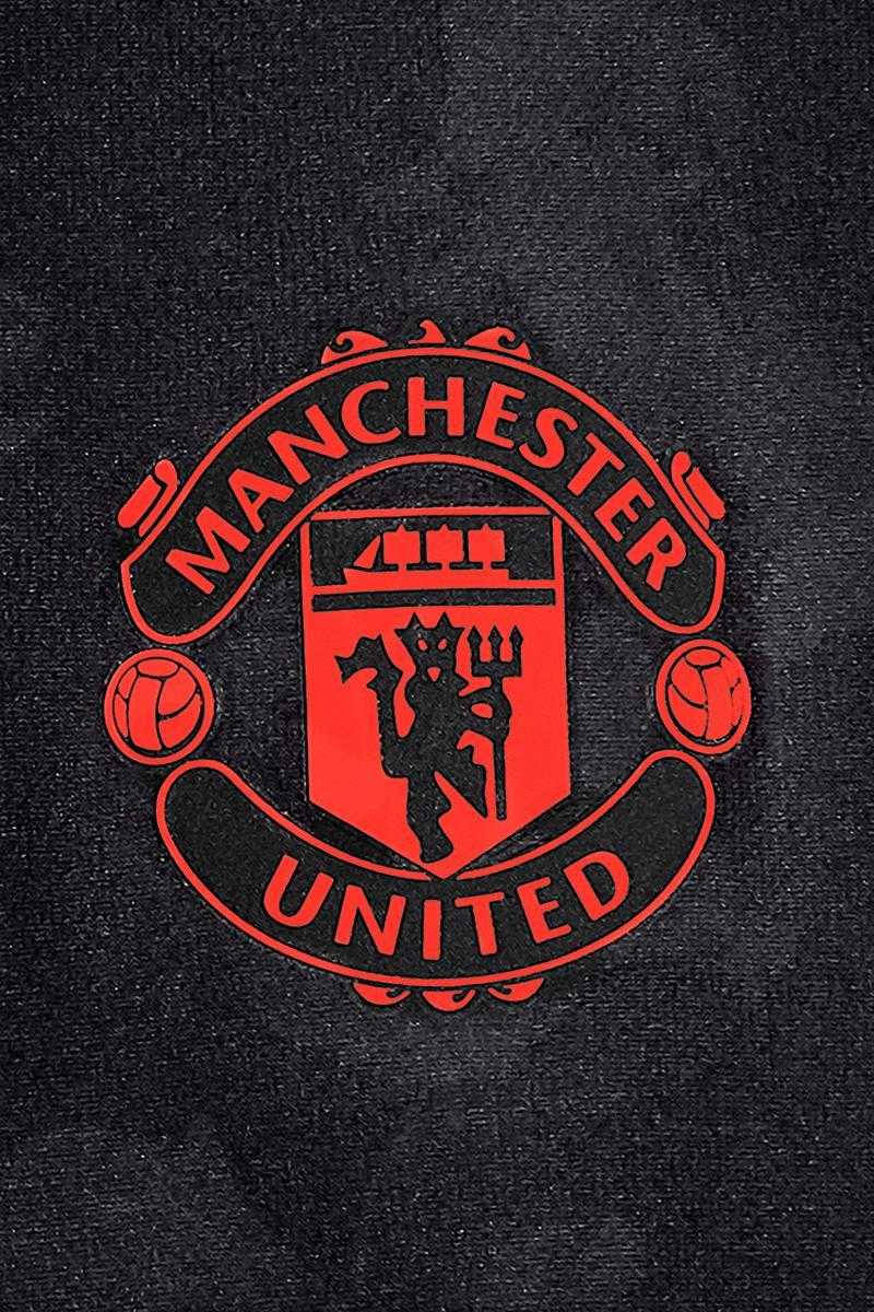 Manchester United Logo With Orange Outline Wallpaper