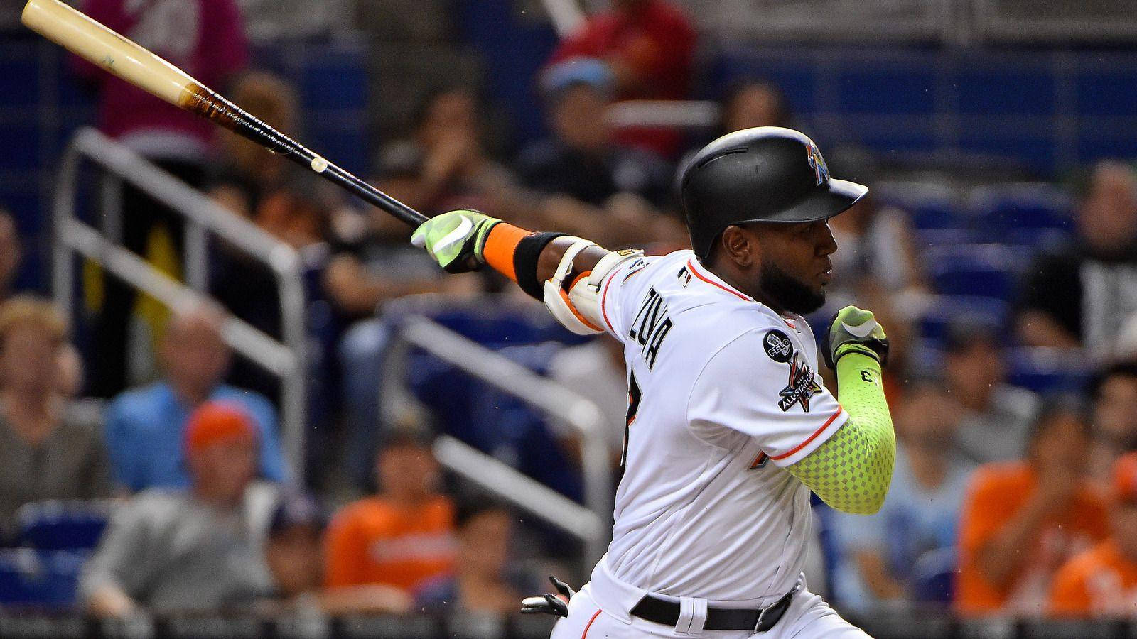 Marcell Ozuna Holding A Bat Wallpaper