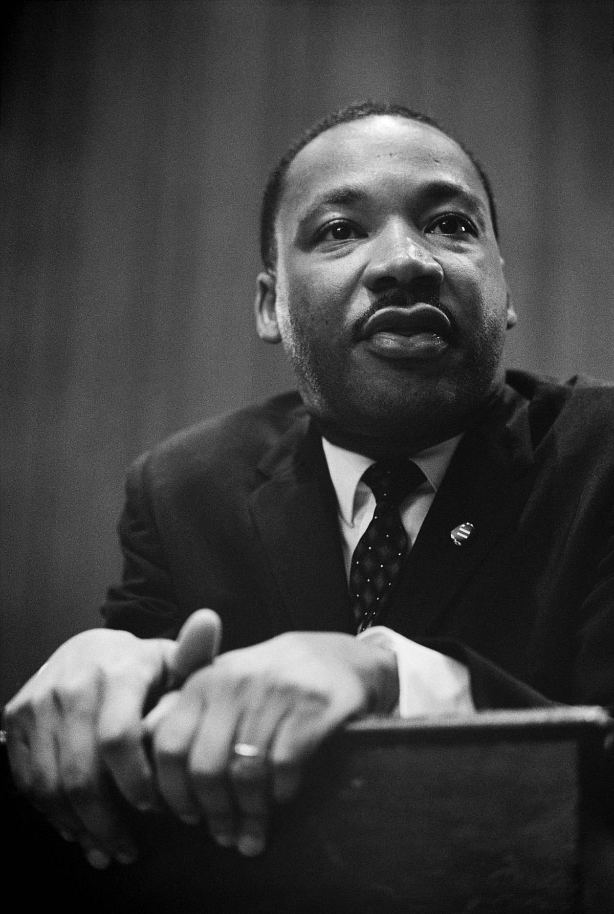 Martin Luther King Jr. Speaking Passionately At A Public Event Wallpaper