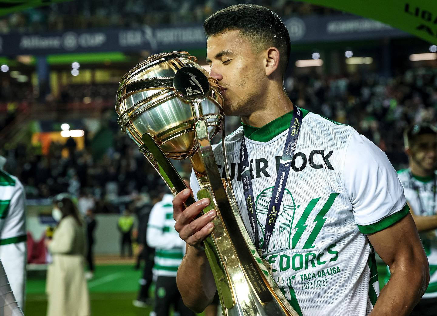 Matheus Nunes Kissing A Trophy Wallpaper