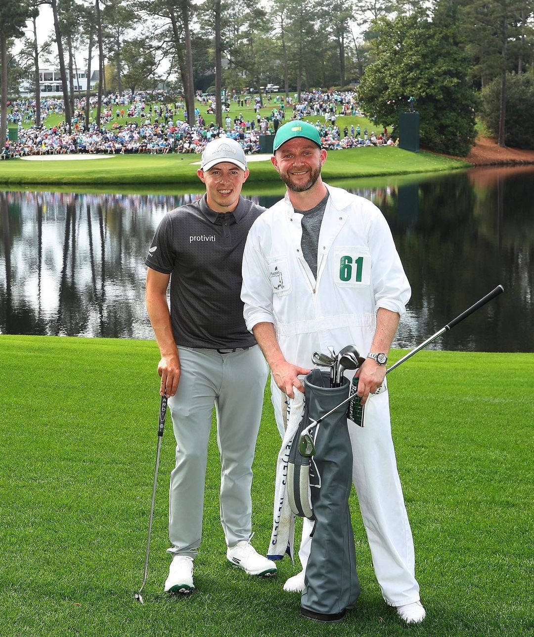 Matt Fitzpatrick With His Caddie Billy Foster During A Golf Tournament Wallpaper