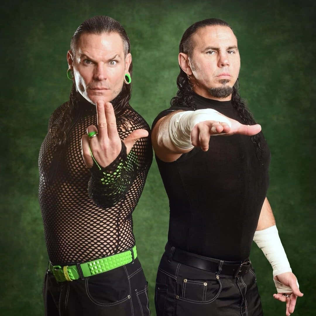 Matt Hardy And Jeff Hardy In Aew Wrestling Action Wallpaper