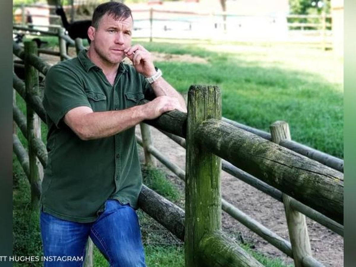 Matt Hughes Posing On Fence Wallpaper