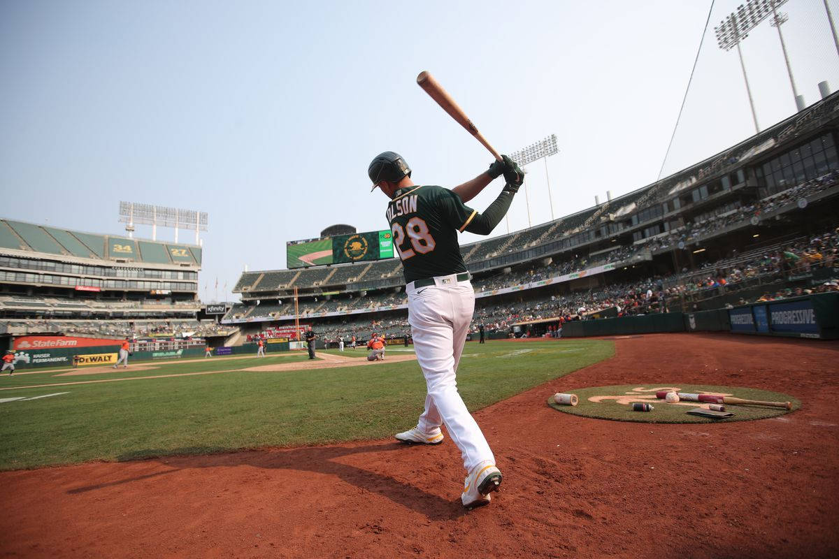 Matt Olson Swinging Bat From Stadium Wallpaper