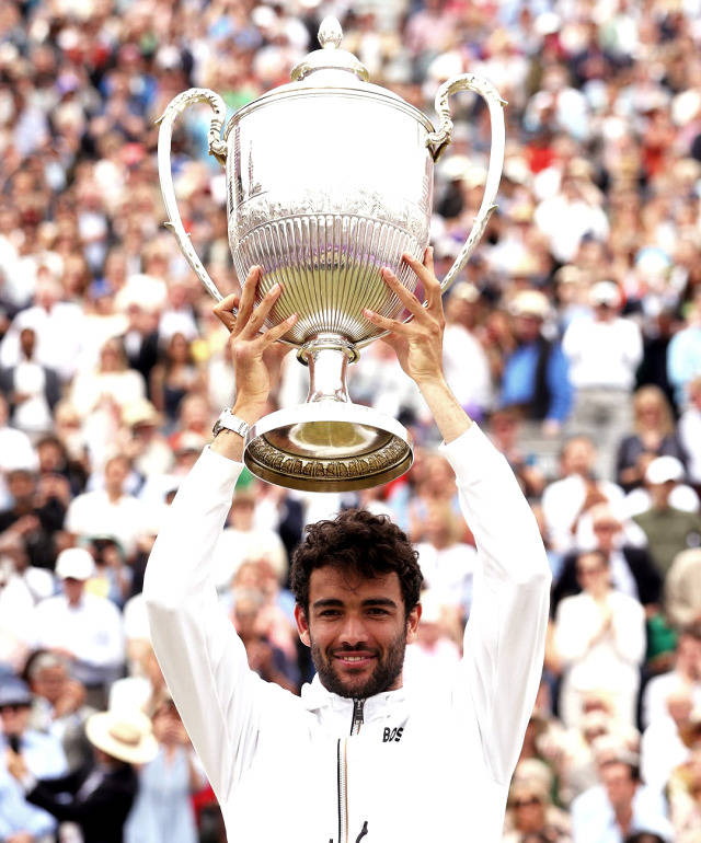 Matteo Berrettini Raising A Trophy Wallpaper