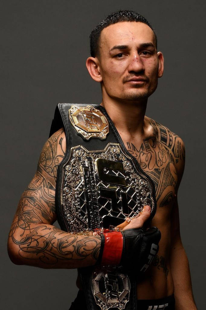 Max Holloway Holding Belt Wallpaper