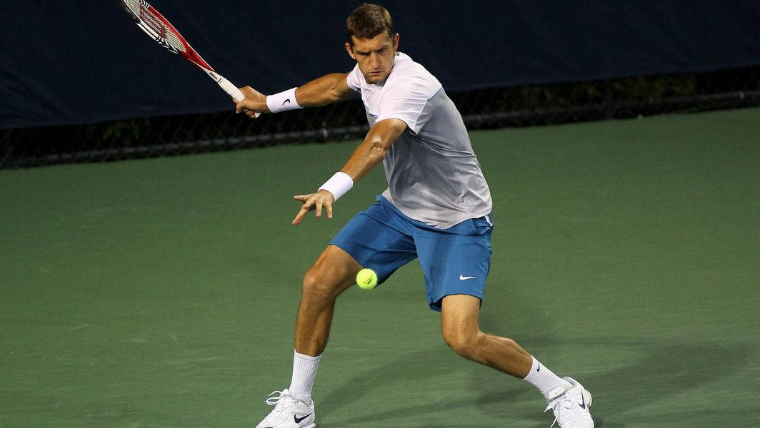 Max Mirnyi Intensely Focusing On Tennis Ball Wallpaper