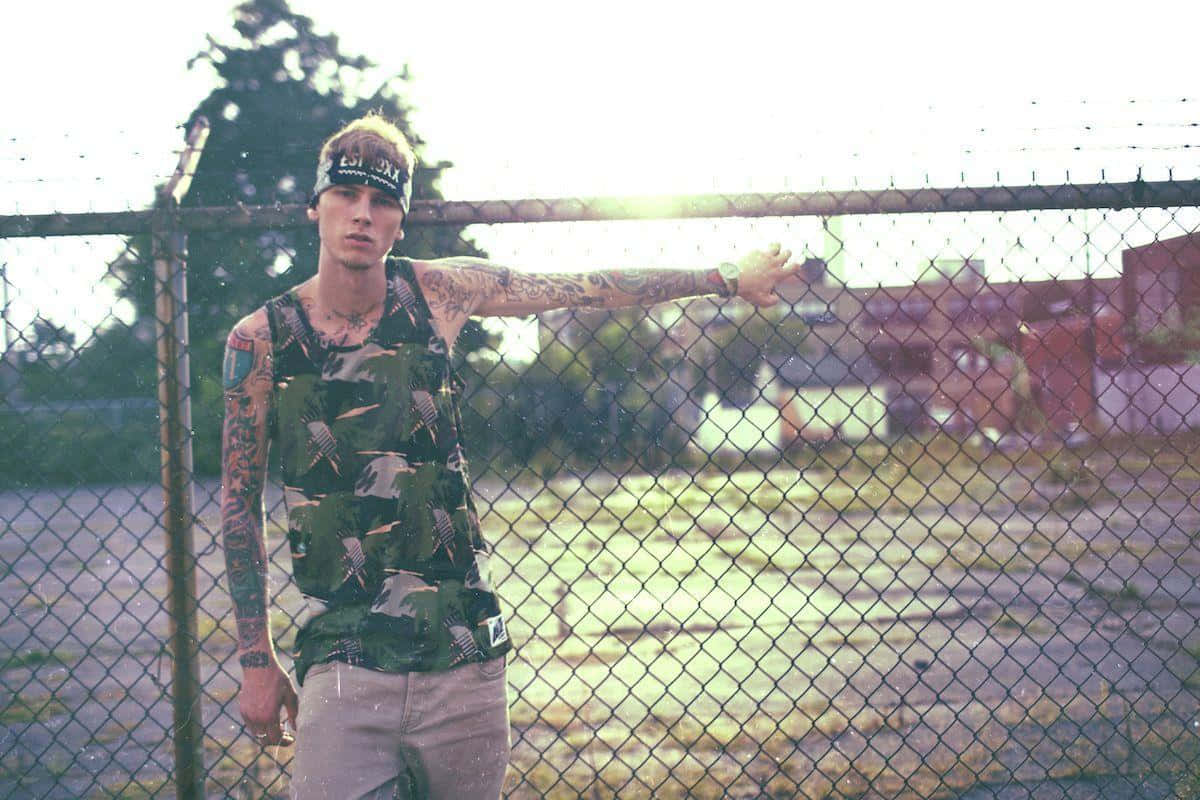 Mgk Rapping On The Stage Wallpaper