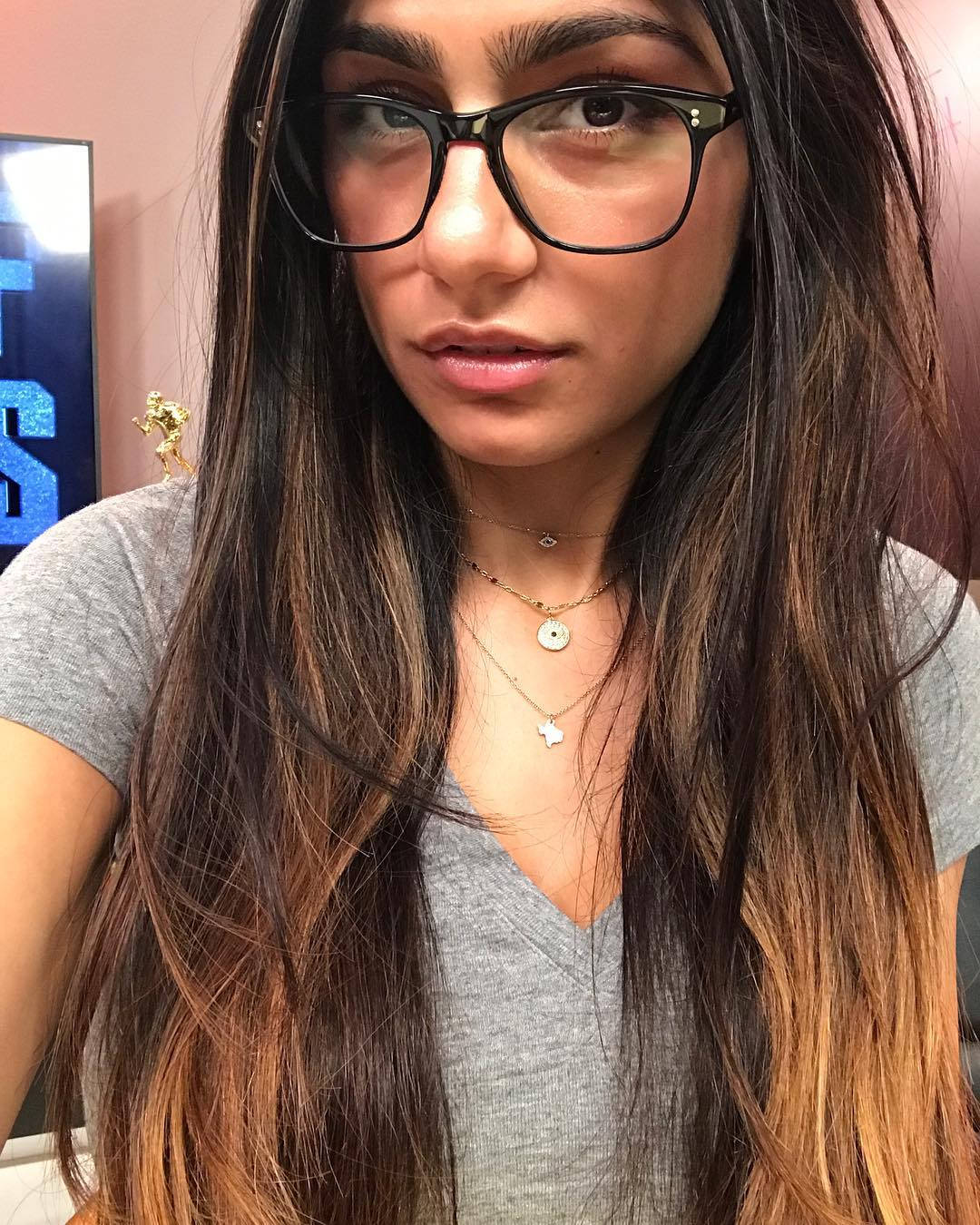 Mia Khalifa Glowing In Reflection: Eyeglass Selfie Wallpaper